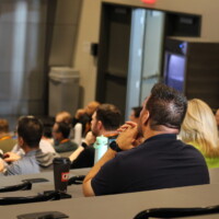 Conference attendees in the lecture hall