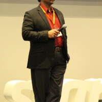 Tariq Azmi welcomes attendees to the conference