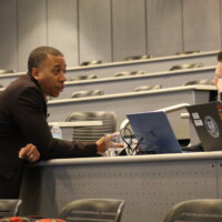 two participants in the Compliance Jam workshop